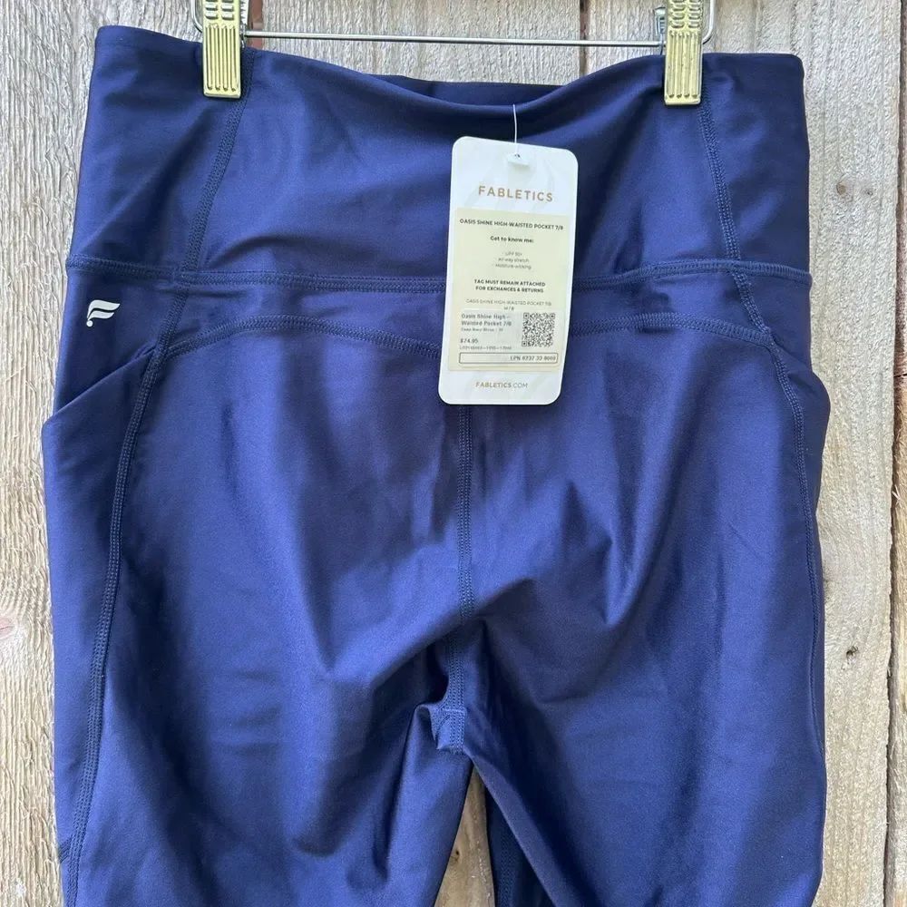 Fabletics Navy Oasis Shine High Waisted Pocket 7/8 Legging - Picture 6 of 9